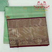 light-green-body-colour-in-zari-butta-with-contrast-blouse-border