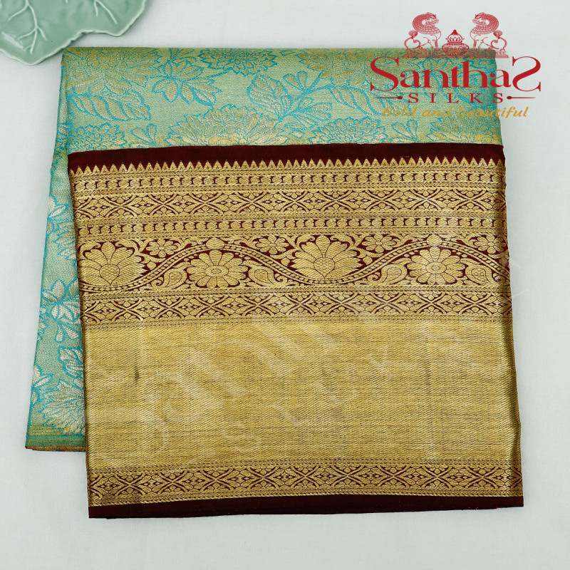 SKY BLUE COLOUR BODY IN TISSUE WITH CONTRAST BLOUSE & BORDER