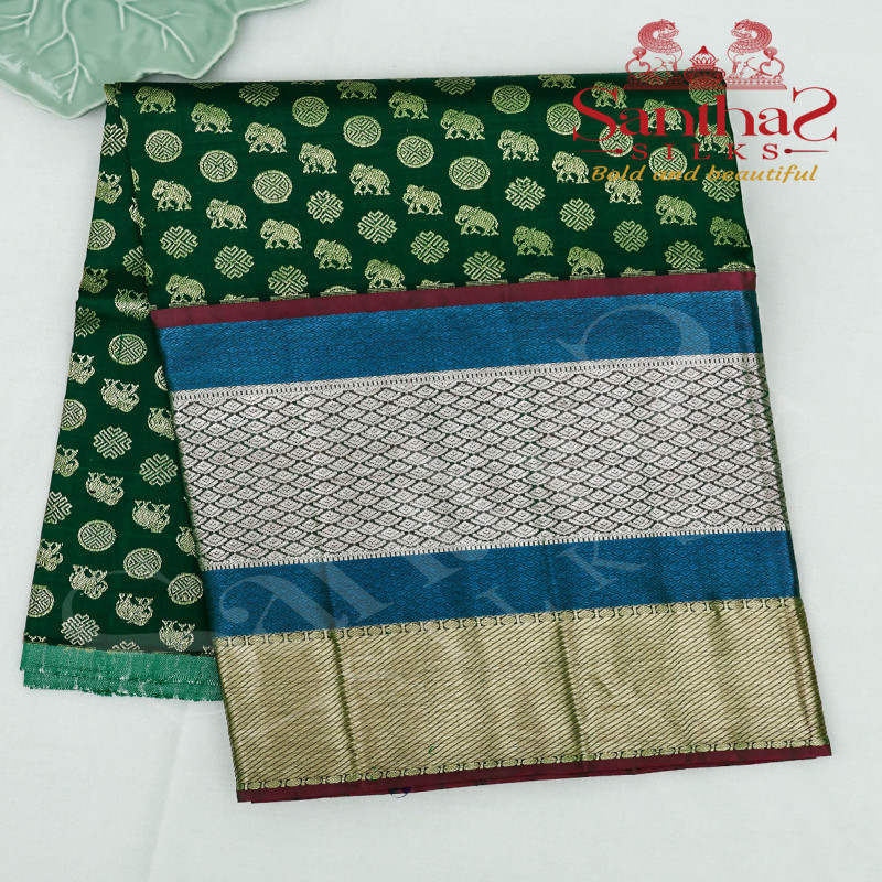 GREEN COLOUR BODY IN ZARI BUTTA WITH CONTRAST BLOUSE & BORDER