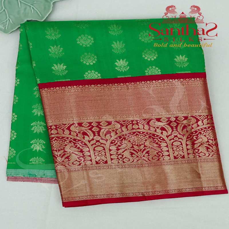 MEENAKSHI GREEN COLOUR BODY IN ZARI BUTTA WITH CONTRAST BLOUSE & BORDER