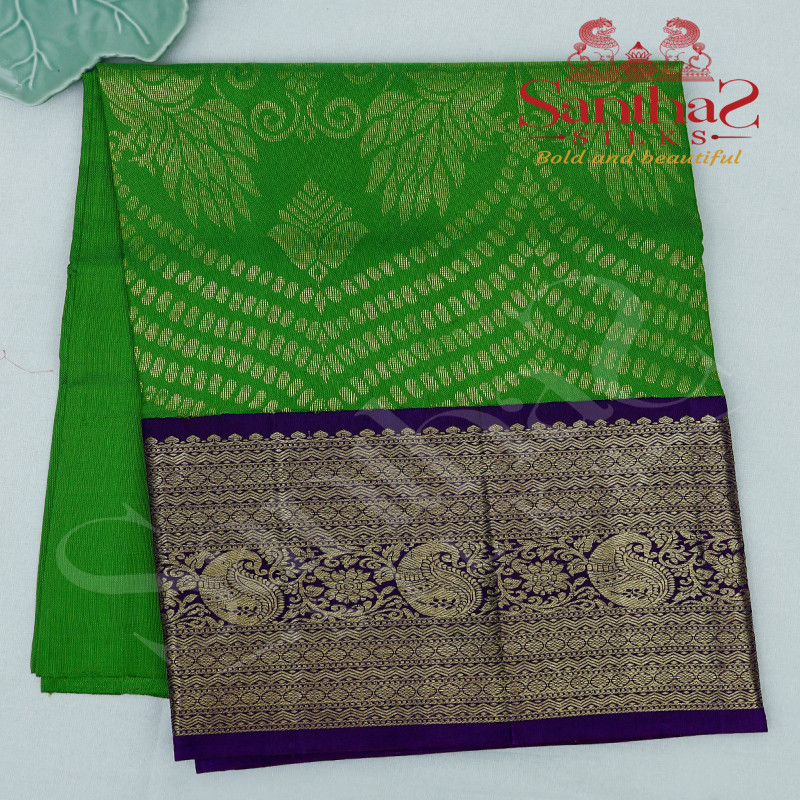 PARROT GREEN COLOUR BODY IN FLORAL PATTERN WITH CONTRAST BLOUSE & BORDER