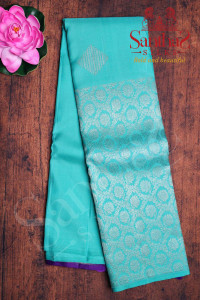 aquamarine-colour-body-in-silver-zari-butta-with-contrast-blouse