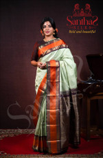 PASTEL GREEN KANJIVARAM SILK SAREE WITH RICH ORANGE BORDER