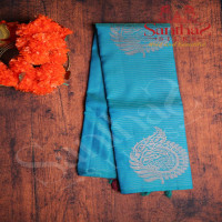 borderless-ramar-blue-colour-body-with-strips-big-motifs-and-dark-brown-colour-contrast-blouse
