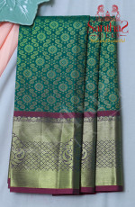 BOTTLE GREEN BODY WITH GOLDEN ZARI BORDER & BLOUSE