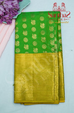 PARROT GREEN BODY IN ANNAM CHAKKRAM BUTTA WITH CONTRAST BLOUSE & BORDER