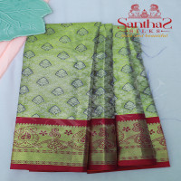 greenish-gold-tissue-pattupavadai-with-contrast-border-and-blouse