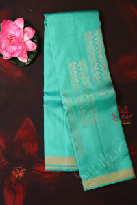 turquoise-blue-colour-body-with-golden-zari-fancy-butta-with-contrast-blouse-border
