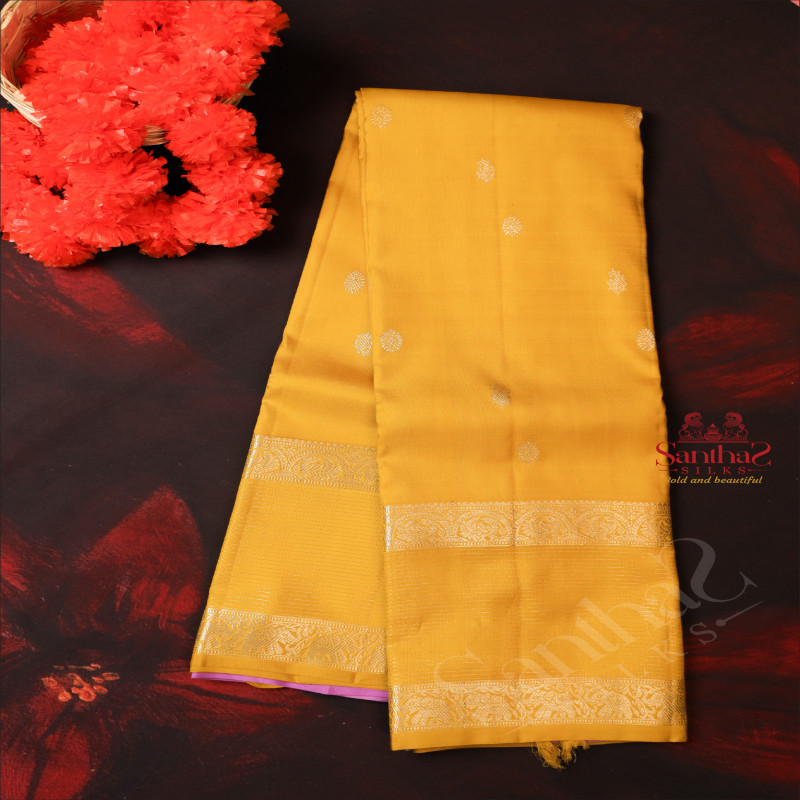 BRIGHT YELLOW COLOUR BODY WITH SILVER ZARI BUTTA WITH CONTRAST BLOUSE & BORDER