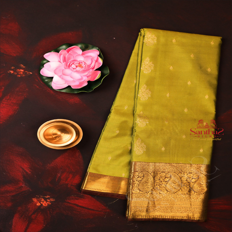 MEHENDHI GREEN COLOUR BODY WITH GOLDEN ZARI BUTTAS WITH CONTRAST BLOUSE & BORDER