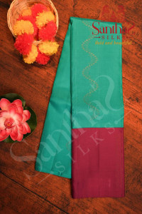 tiffany-blue-colour-body-with-rosegold-zari-in-kodi-pattern-and-contrast-blouse