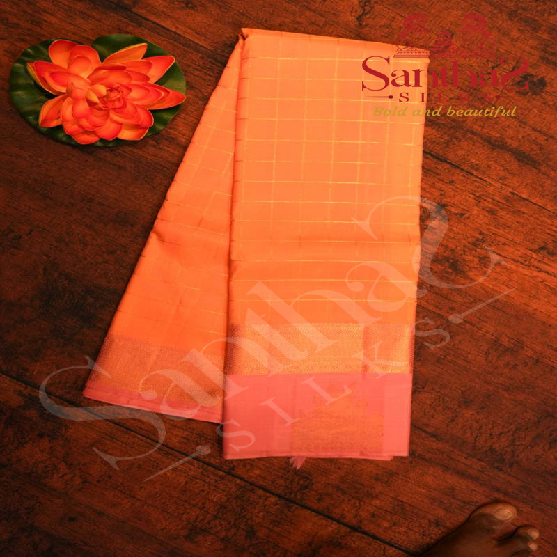 YELLOWISH PINK COLOUR BODY WITH GOLDEN ZARI CHECKED AND CONTRAST BLOUSE