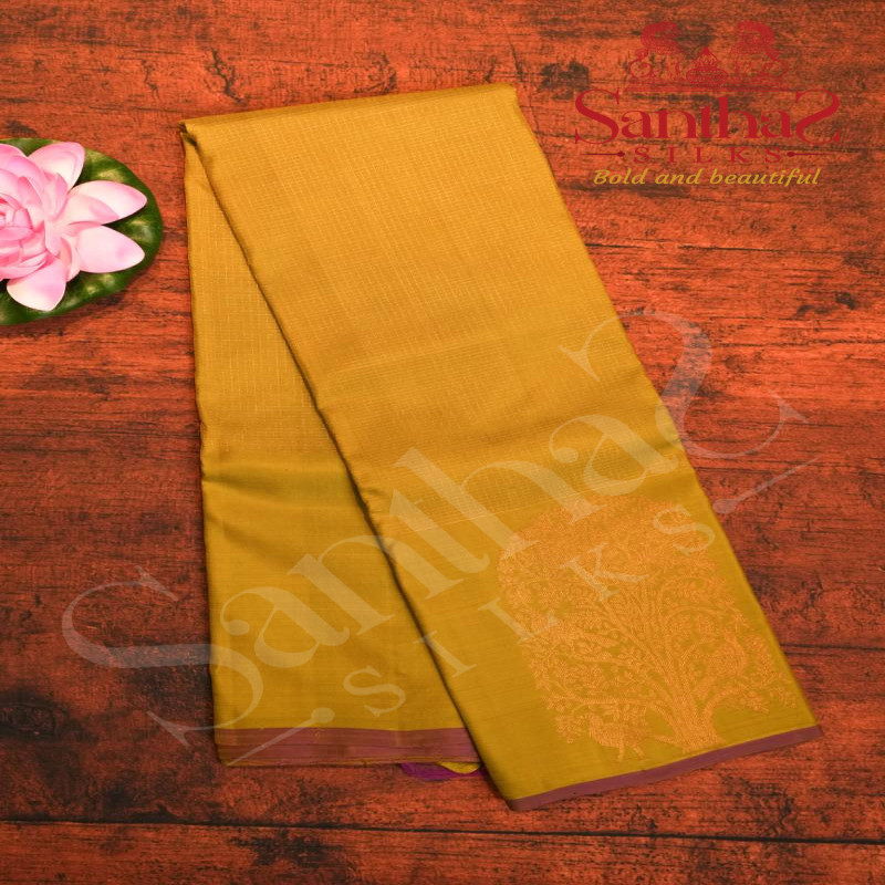 PEAR GREEN COLOUR BODY WITH COPPER ZARI IN CHECKED PATERNS & TREE MOTIFS AND CONTRAST BLOSE