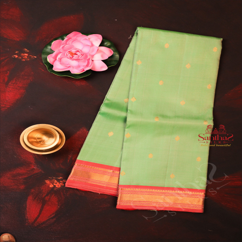 PARIS GREEN COLOUR BODY WITH GOLDEN ZARI BUTTA WITH CONTRAST BLOUSE & BORDER