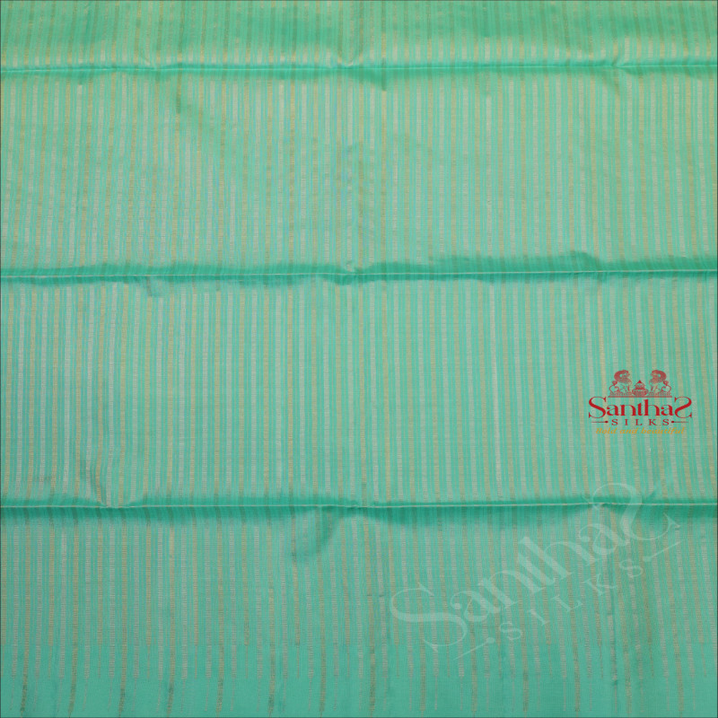 TURQUOISE BLUE COLOUR BODY WITH GOLDEN & SILVER ZARI STRIP LINES AND SELF COLOUR PALLU & BLOUSE