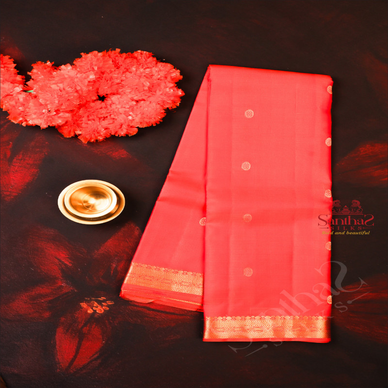 ORANGISH RED COLOUR BODY WITH SMALL BUTTAS AND SELF COLOUR PALLU WITH SELF COLOUR BLOUSE