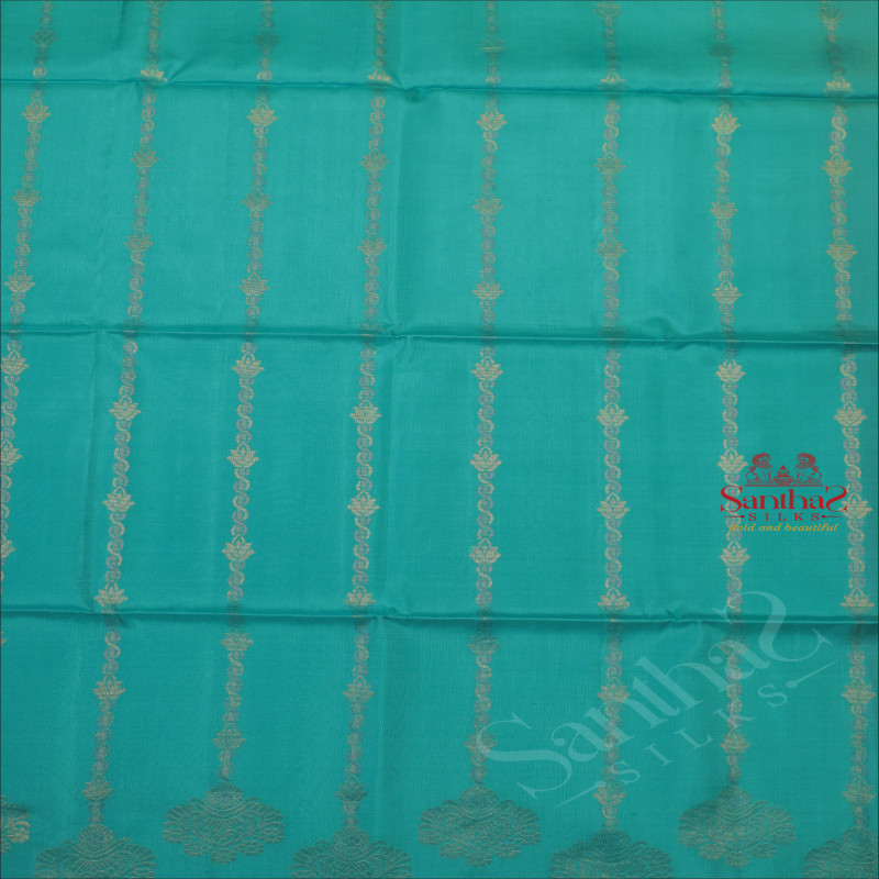 TURQUOISE BLUE COLOUR BODY WITH SILVER ZARI FLORAL BUTTA WITH CONTRAST BLOUSE & BORDER