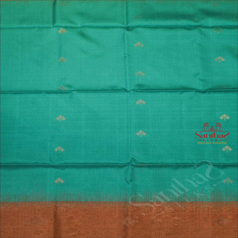 TEAL BLUE COLOUR BODY WITH GOLDEN ZARI LEAF BUTTA WITH CONTRAST BLOUSE & BORDER