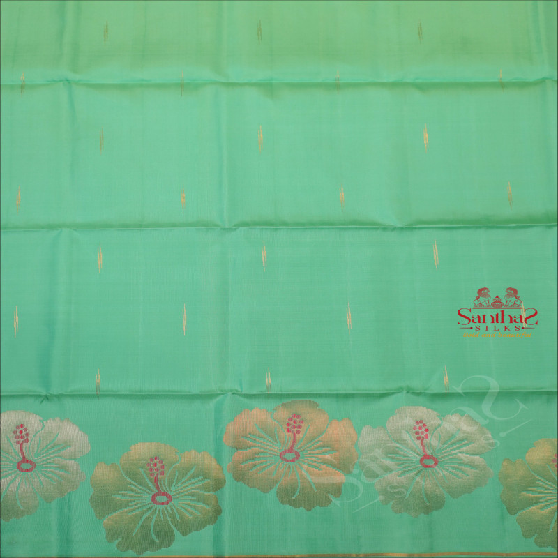 TORQUOISE BLUE COLOUR BODY WITH GOLDEN ZARI FANCY BUTTA WITH CONTRAST BLOUSE & BORDER