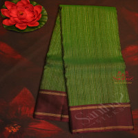 bottle-green-colour-body-with-silver-gold-zari-strips-and-contrast-colour-blouse-and-pallu