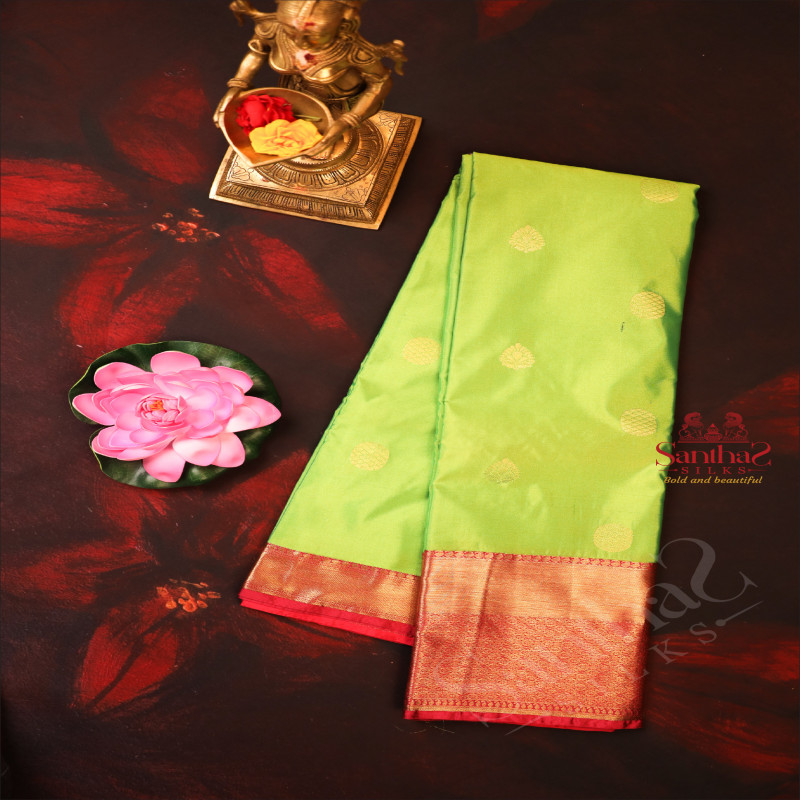 LAWN GREEN COLOUR BODY WITH GOLDEN ZARI BUTTA WITH CONTRAST BLOUSE & BORDER