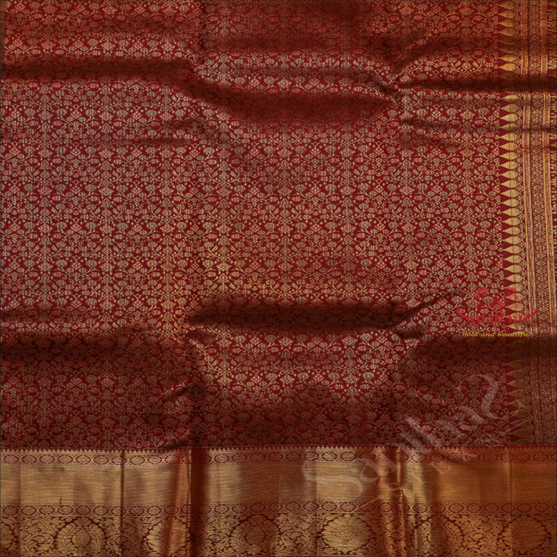 MAROON COLOUR BODY WITH GOLDEN FLORAL BUTTA WITH SELF BLOUSE & BORDER