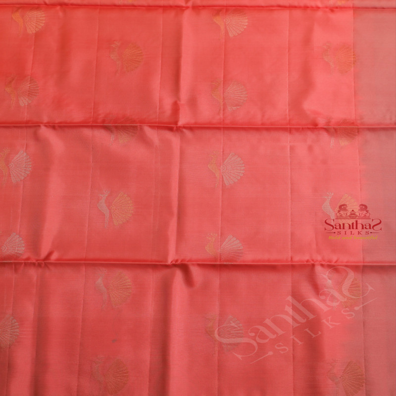 PASTEL PEACH COLOUR BODY WITH GOLDEN ZARI PEACOCK BUTTA WITH CONTRAST BLOUSE & BORDER