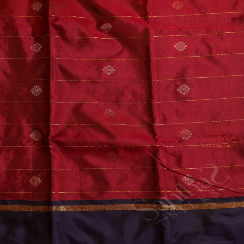 DARK PINK COLOUR BODY WITH GOLDEN STRIPS AND BUTTA WITH CONTRAST BLOUSE & BORDER