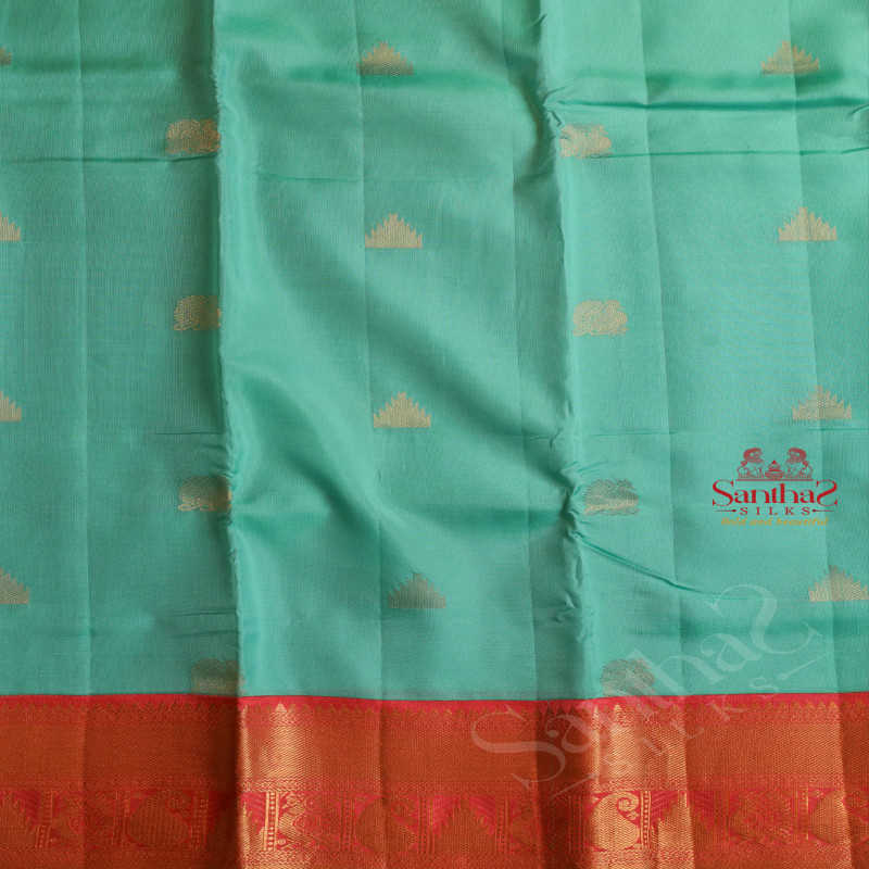 TURQUOISE BLUE COLOUR BODY WITH FGOLDEN ZARI BUTTA WITH CONTRAST BLOUSE & BORDER