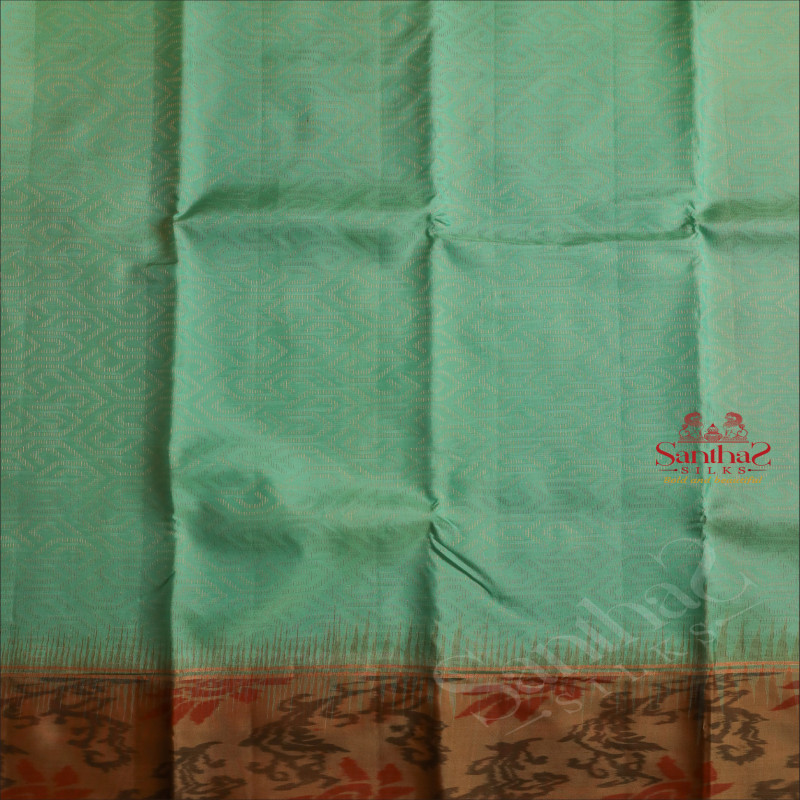 MEDIUM AQUAMARINE BLUE COLOUR BODY WITH GOLDEN ZARI EMBOSED WITH CONTRAST BLOUSE & BORDER
