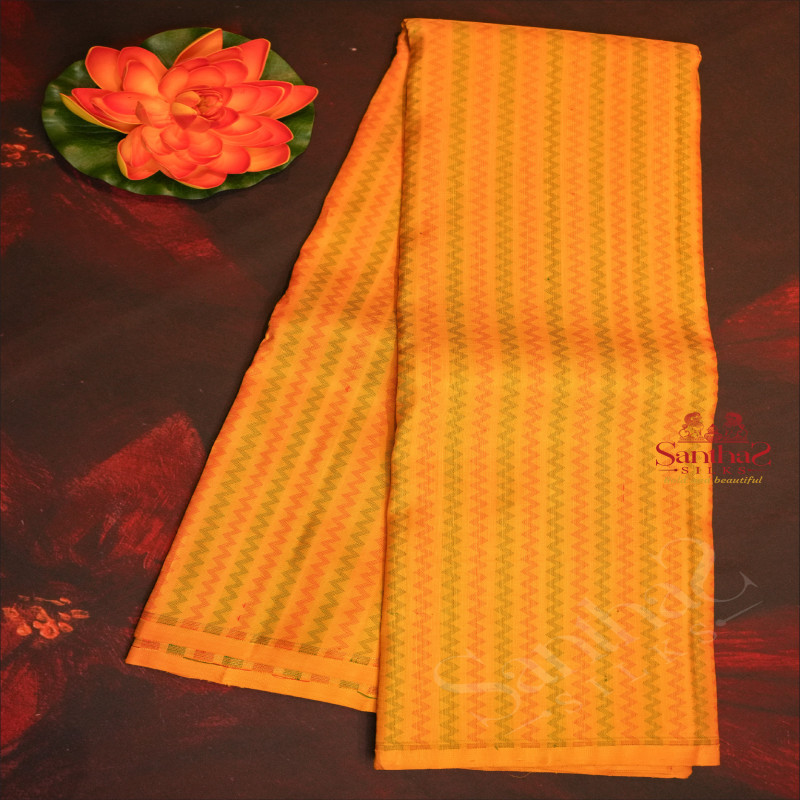 BORDERLESS AMBER YELLOW COLOUR FANCY PATTERN WITH CONTRAST BLOUSE