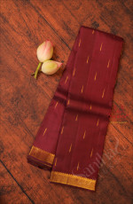 MAROON COLOUR BODY WITH GOLDEN ZARI MOTIF AND BORDER WITH SELF BLOUSE