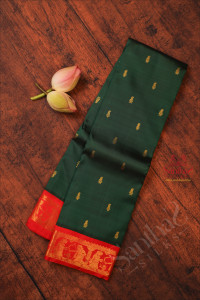 bottle-green-colour-body-with-golden-zari-butta-with-contrast-blouse-border