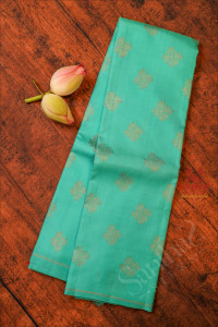 torquoise-blue-colour-body-with-golden-zari-kolam-butta-with-contrast-blouse