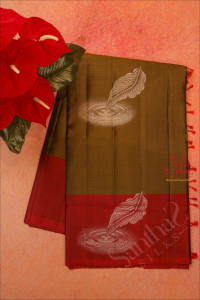 mehendhi-green-colour-body-with-silver-zari-leaf-butta-with-contrast-blouse-border