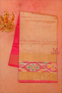 light-peach-colour-body-with-golden-silver-zari-butta-with-contrast-blouse