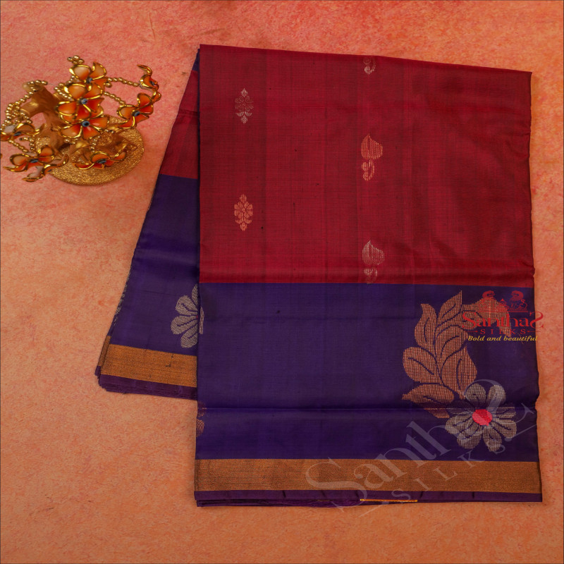 MAROON COLOUR BODY WITH GOLDEN ZARI LEAF AND FLORAL BUTTA WITH CONTRAST BLOUSE & BORDER