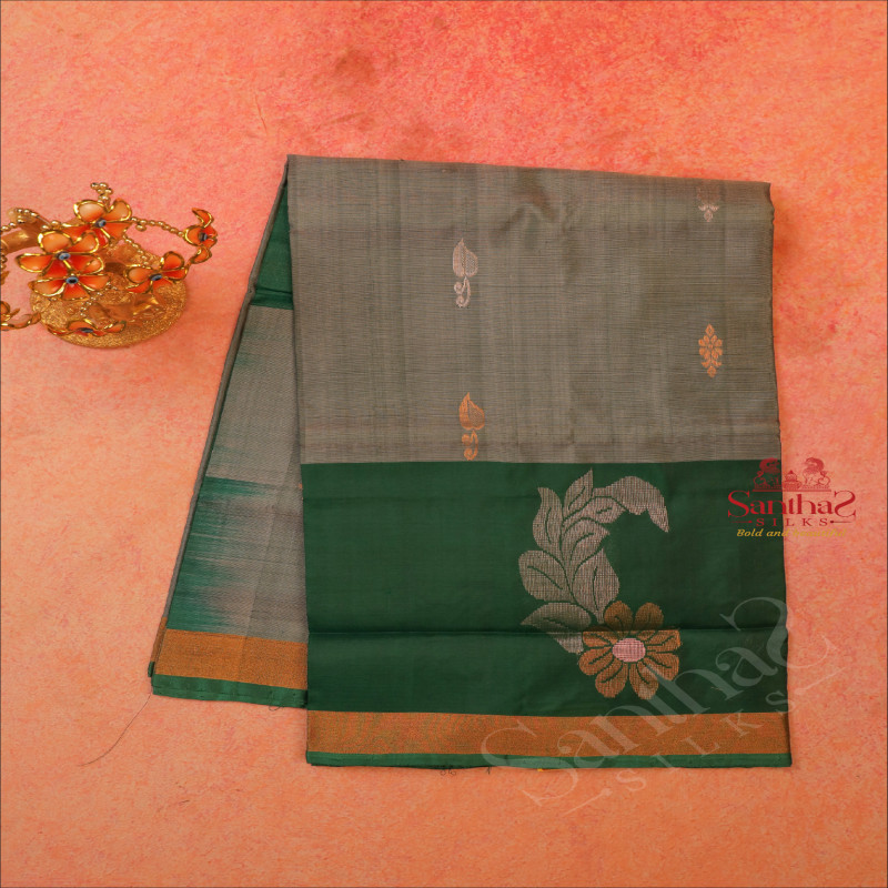 GREYISH GREEN COLOUR BODY WITH SILVER ZARI BUTTA WITH CONTRAST BLOUSE & BORDER