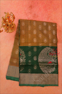 mehendhi-green-colour-body-with-silver-zari-butta-with-contrast-blouse-border