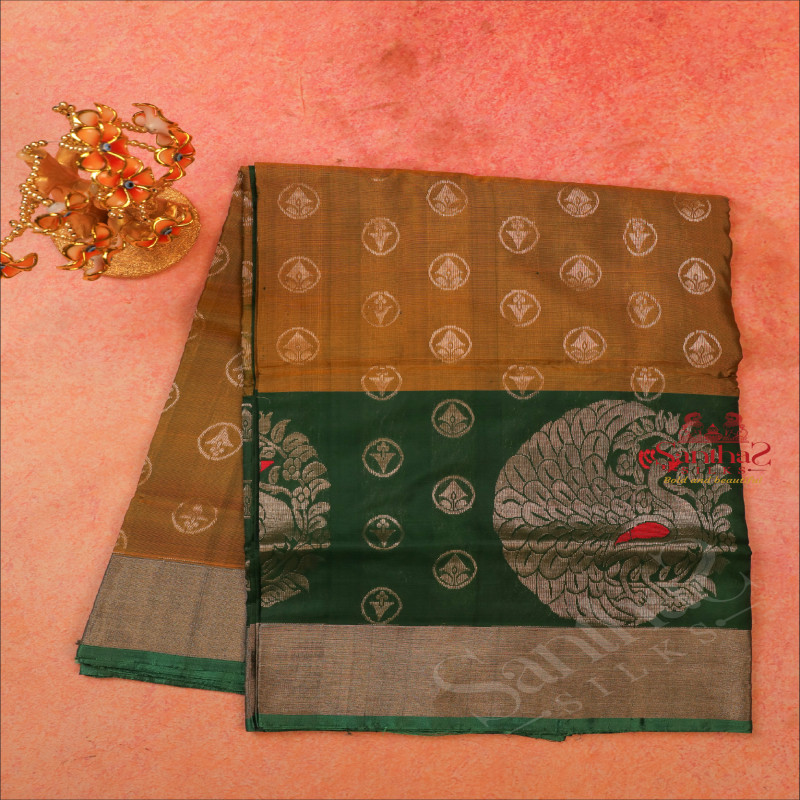 MEHENDHI GREEN COLOUR BODY WITH SILVER ZARI BUTTA WITH CONTRAST BLOUSE & BORDER