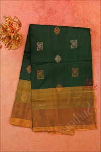 bottle-green-colour-body-with-golden-and-silver-zari-leaf-flower-butta-with-contrast-blouse-border
