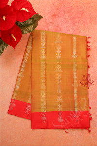 double-shade-mustard-colour-body-with-silver-zari-floral-and-leaf-butta-with-contrast-blouse-border