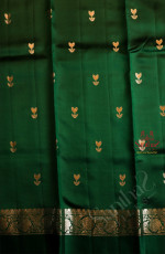 RAW MANGO SAREE IN BOTTLE GREEN COLOUR WITH ZARI BUTTA WITH CONTRAST BLOUSE