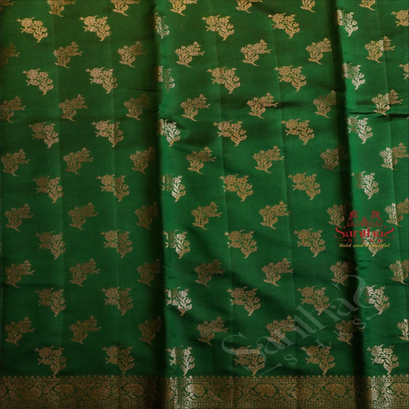 CHINIYA SAREE IN FOREST GREEN COLOUR WITH GOLD ZARI FLOWER MOTIFS AND CONTRAST COLOUR PALLU & BLOUSE