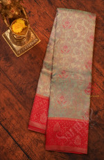 PASTEL BLUE COLOUR BODY WITH JACQUARD EMBOSED PATTERN WITH CONTRAST BLOUSE & BORDER