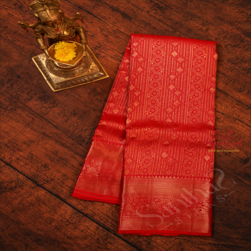 RED COLOUR BODY WITH FLORAL PATTERN EMBOSED BUTTA WITH SELF BLOUSE & BORDER