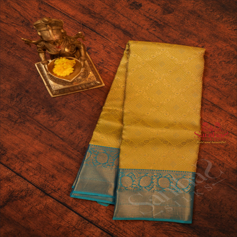 LEMON YELLOW COLOUR BODY WITH GOLDEN ZARI EMBOSED WITH CONTRAST BLOUSE & BORDER