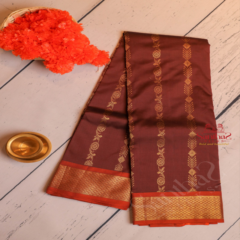 COFFEE BROWN COLOUR BODY WITH GOLDEN ZARI FLORAL BUTTA WITH CONTRAST BLOUSE & BORDER