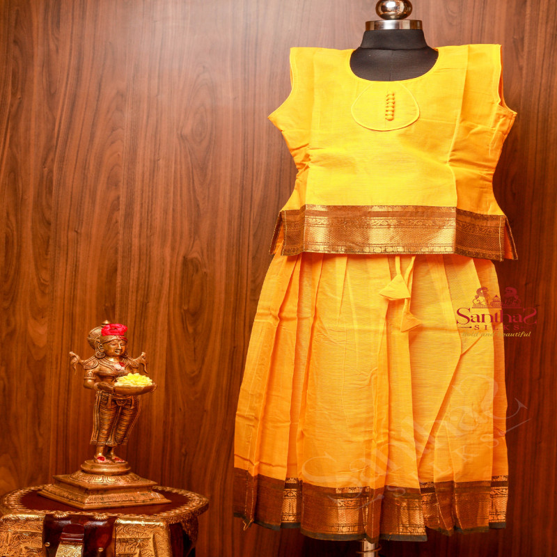 MANGO YELLOW COLOUR COTTON PAVADAI WITH TOP