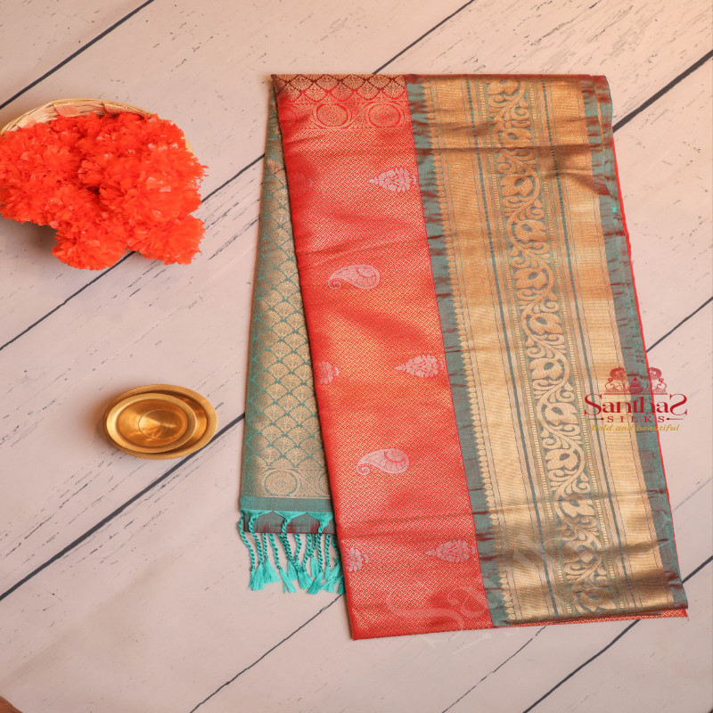 ORANGE COLOUR BODY WITH EMBOSED MANGO ZARI BUTTA WITH CONTRAST BLOUSE & BORDER